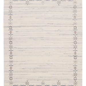 Ivory And Blue Tribal Border Design Hand Loomed Wool Area Rug