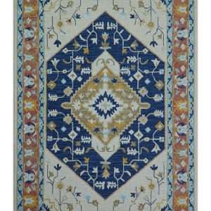 Ollie Traditional Blue And Ivory Hand Tufted Wool Rug